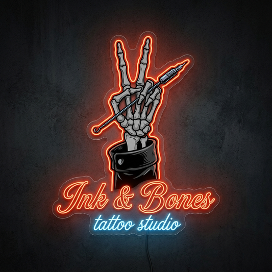 UV-bedrucktes LED-Neon-Logo „Ink & Bones“ im Tattoostudio – Neon Atelier